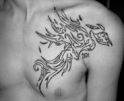 Phoenix Image Tattoo On Chest Of Man