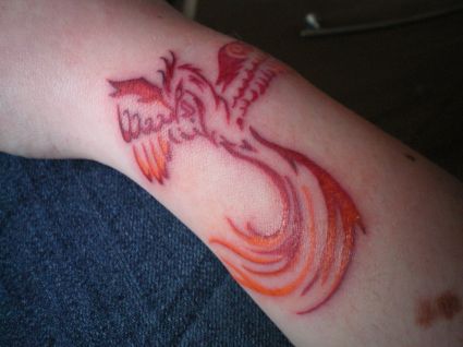 Tribal Phoenix Pic Tattoo On Arm