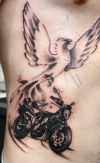 phoenix and bike pic tattoo on rib