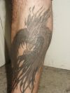 phoenix image tattoo on leg