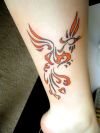 phoenix pic tattoo on leg