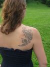 girl with phoenix tattoo