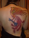 phoenix with key pic tattoo on back