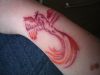 tribal phoenix pic tattoo on arm