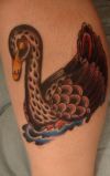 swan tattoos on leg