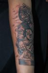 joker with dice tattoo pics