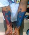 batman and superman tattoo