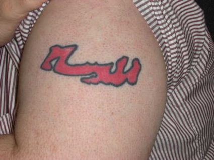 Arabic Symbol Tattoo On Arm