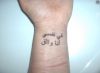 arabic text tattoo on wrist