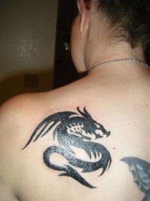 Tribal Dragon Left Shoulder Tattoo Of Girl