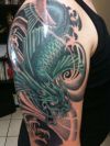 dragon pic tattoo on half sleeve
