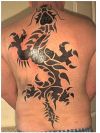tribal dragon pic tattoo on back