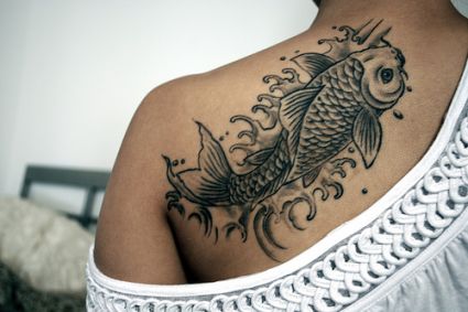 Koi Fish Tattoo At Girls' Back