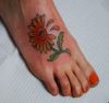 daisy tattoo on feet