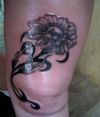 daisy tattoo on knee