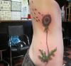 dandelion flower tattoo on side rib