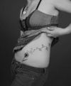 dandelion flower tattoos on side stomach