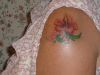hibiscus flower tattoo on shoulder