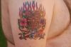 Hibiscus tat design on arm
