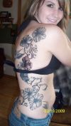 hibiscus tats on side back