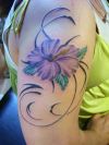 hibiscus girl's arm tattoo