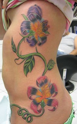 Lily Flower Women's Rib Tattoo
