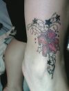 Lily tattoo on ankle