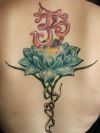lotus and om back tattoo