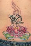 Lotus tattoo on lower back