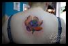 tattoo lotus on back of girl