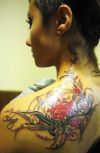 lotus and tribal tattoo