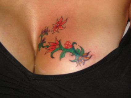 Flower Breast Tattoo