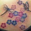 flower and dragonfly tattoo
