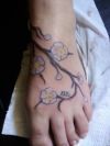 flower feet tattoo