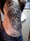 flower and skull tattoo