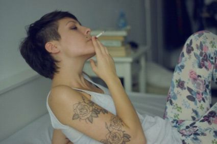 Smoking Girl With A Rose Tattoo