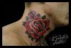 Rose tattoo design on neck