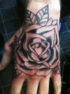 rose tattoo on back of palm