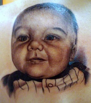 Kid`s Portrait Inked On Back Shoulder 
