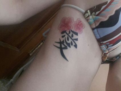 Kanji Tattoo On Ribs