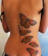 butterfly girl tattoo