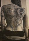 women full back tattoo