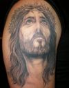 jesus images tattoos on arm