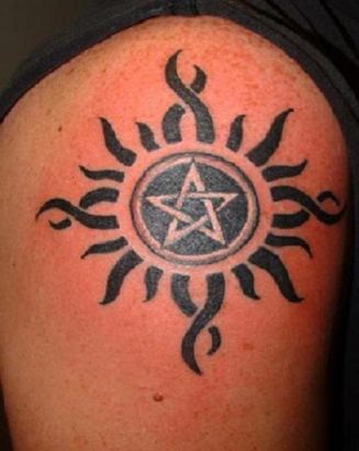 Pentagram And Sun Tattoo On Arm