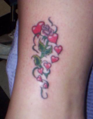 Small Love Heart And Leaf Tattoo