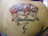 cards tattoo on right shoulder blade