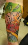gambling arm tattoo pics