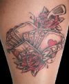 rose and cards tattoo