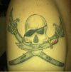 pirates tattoo on shoulder