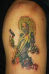 iron maiden tattoo on arm